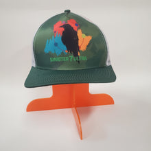 Load image into Gallery viewer, 2024 Sinister 7 Ponytail Trucker Hat w/ Raven Orbit (Green Camo &amp; White) - Unisex
